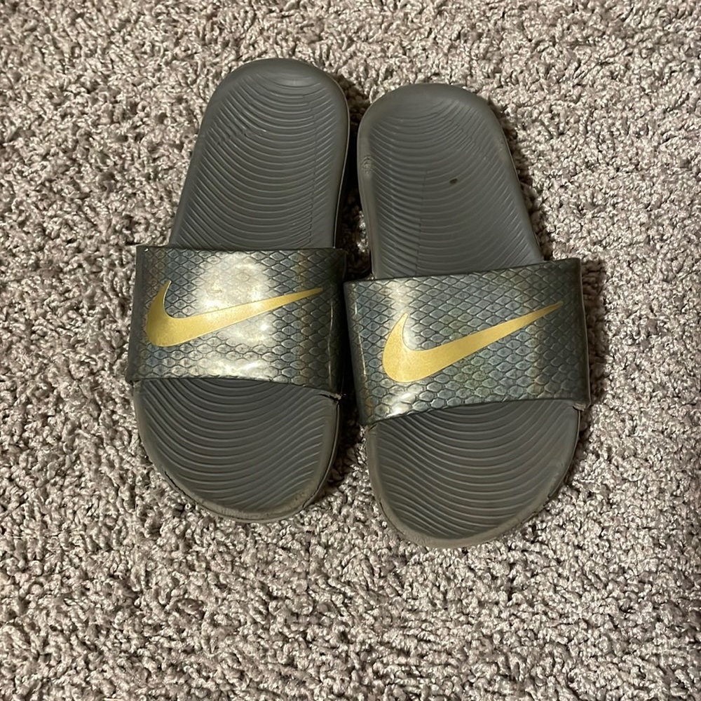Youth size 1 Nike slides